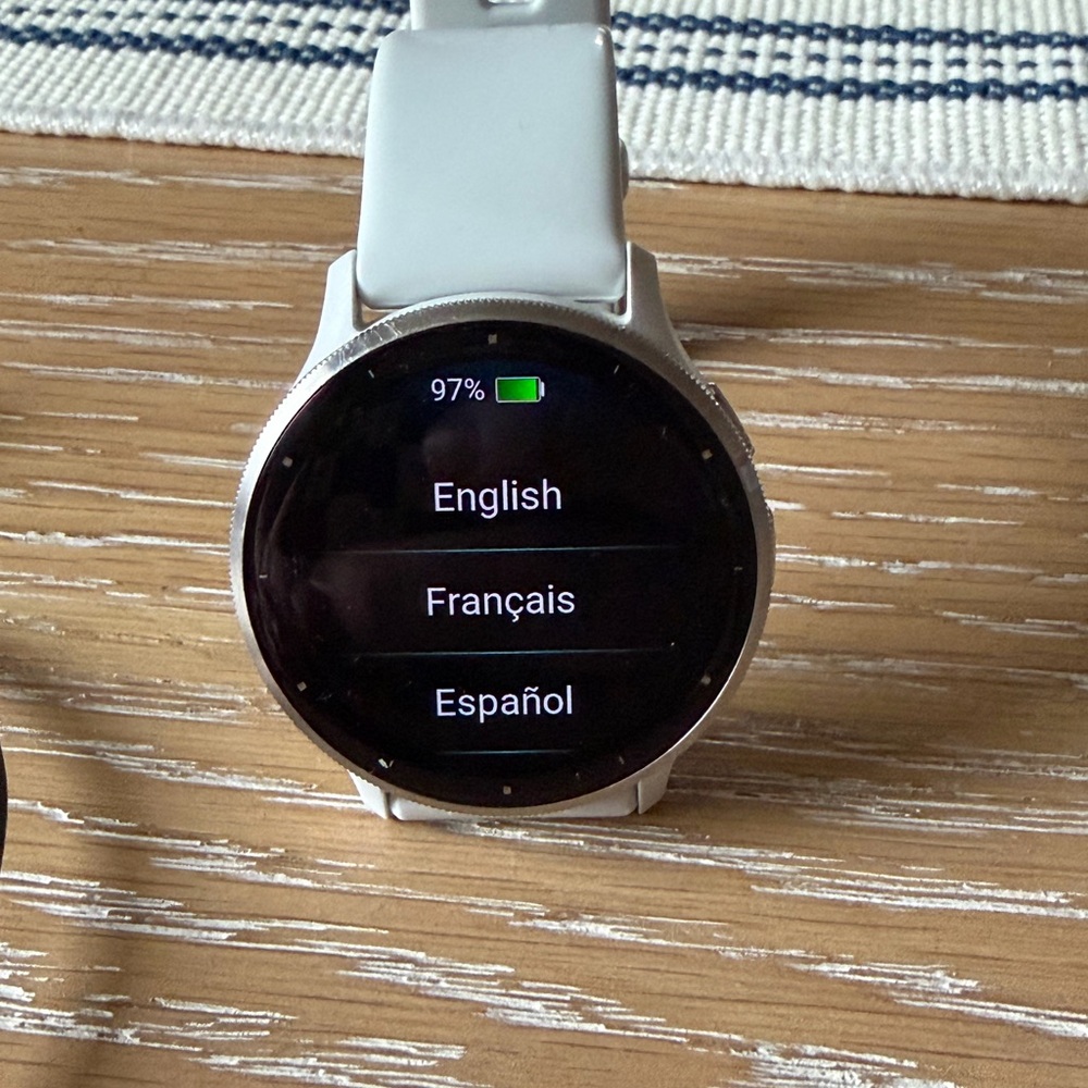 Garmin Smartwatch with Silver Bezel and White Band